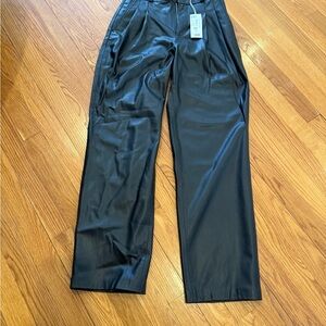 Black leather pants, pleated